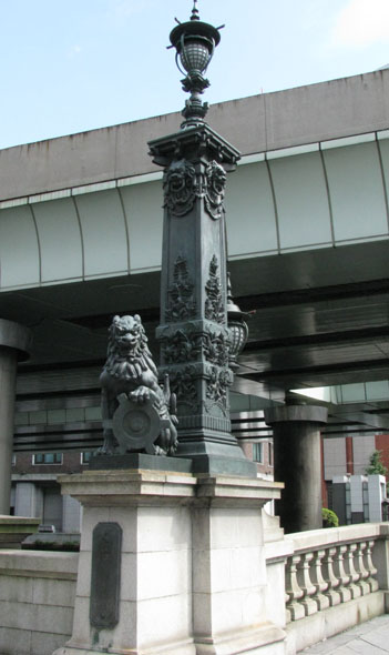 Figure 9 Bronze Lanterns on Nihonbashi Bridge in Tokyo designed by Ishikawa Kōmei. Photo: Aimaimyi. Creative commons license.